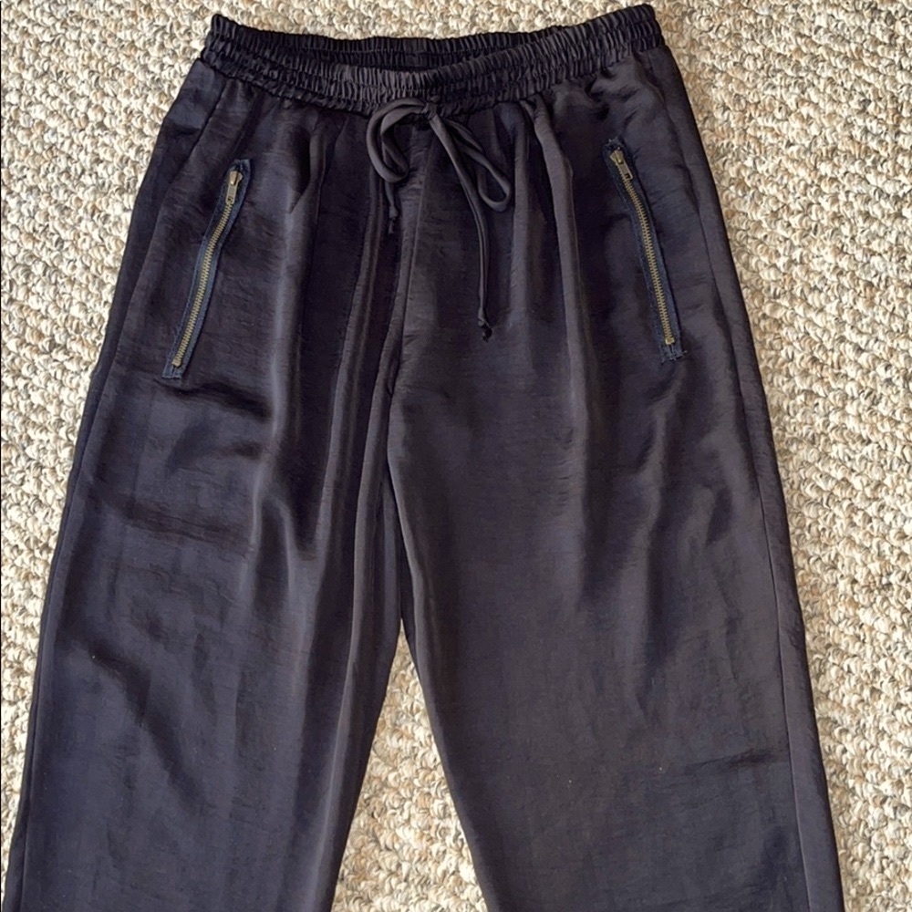 Satin black joggers with zipper detail